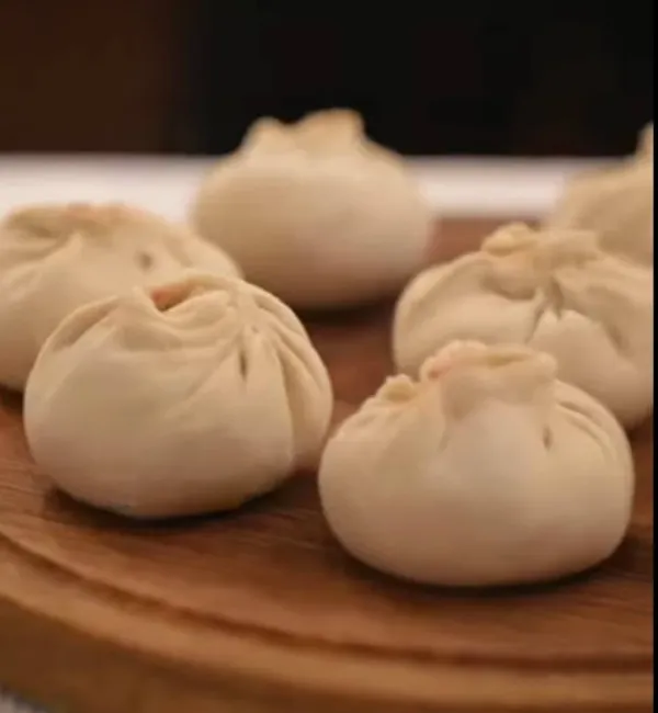 Шеф повар делится рецептом бууз